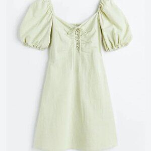 H&M Mini Light Green dress with puffy sleeves and a tie detail